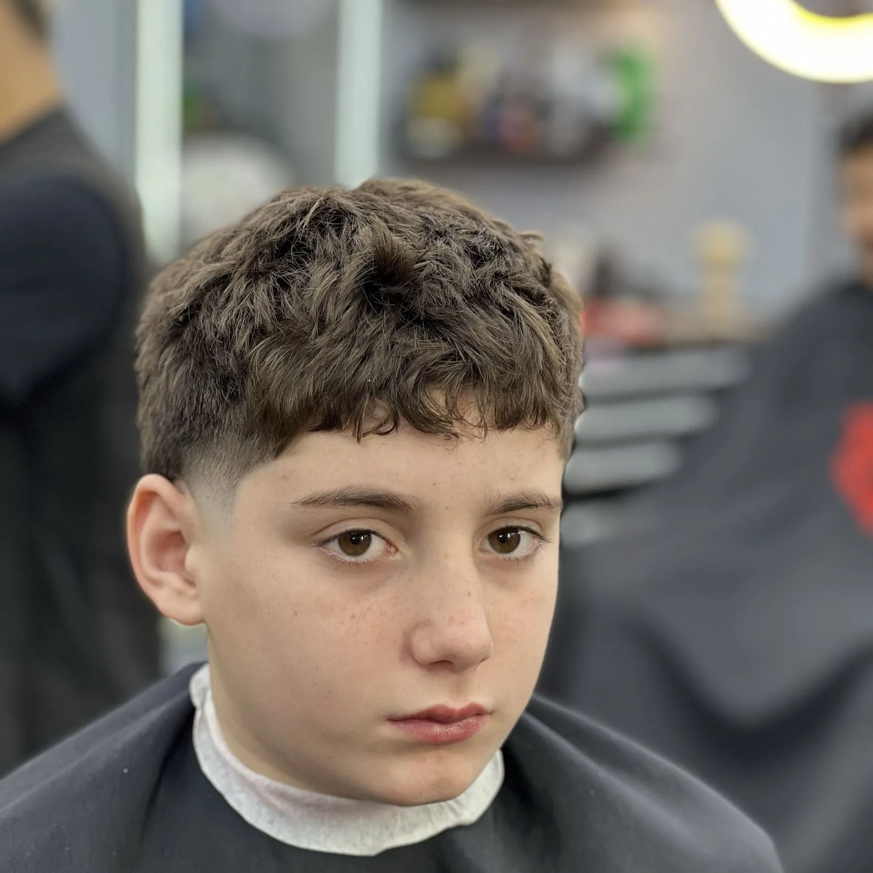 Boy with a fresh textured crop and taper, Father + Son package at DomiBarberz