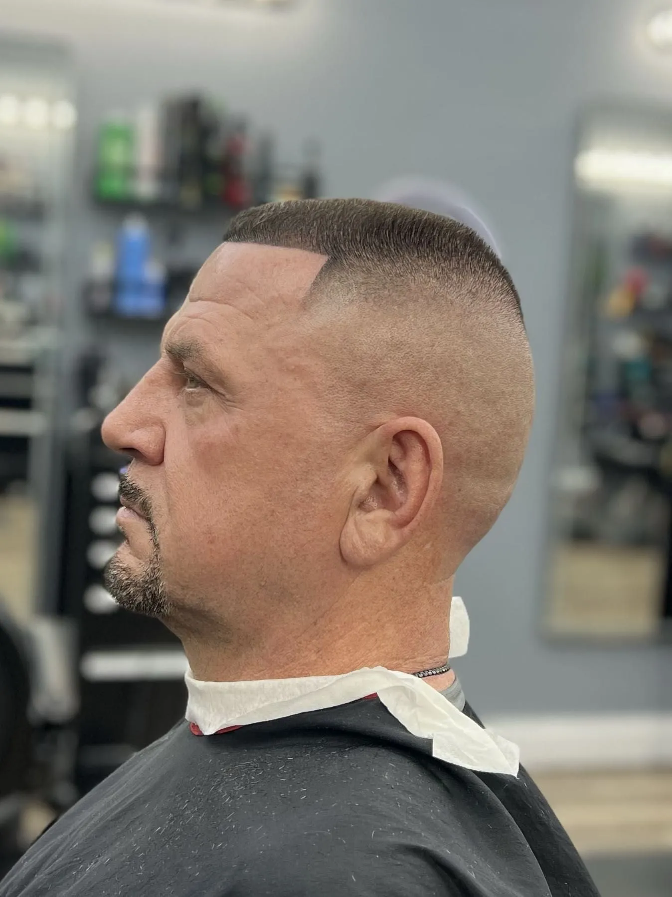 Classic high skin fade, side profile